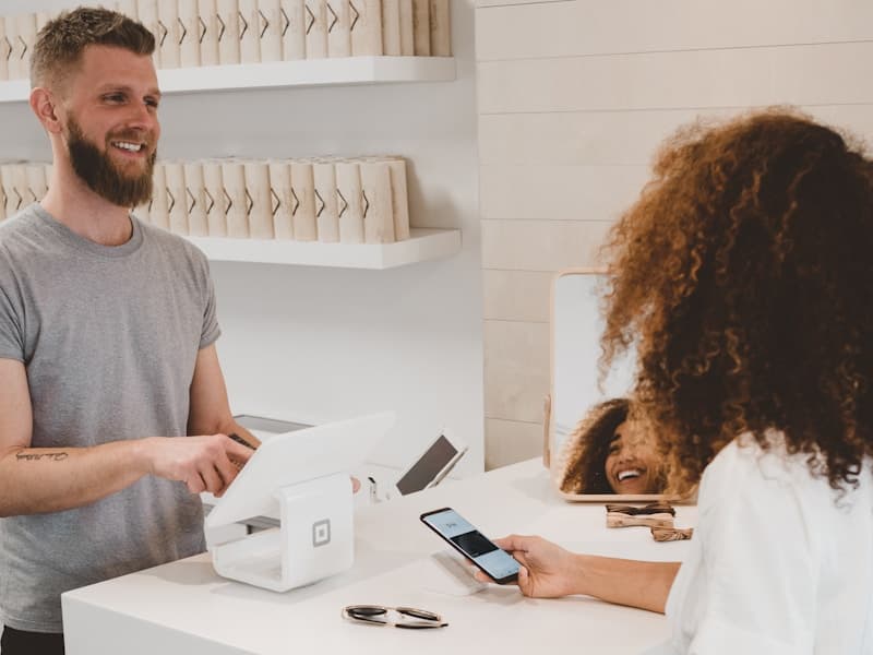 Bank teller helping customer